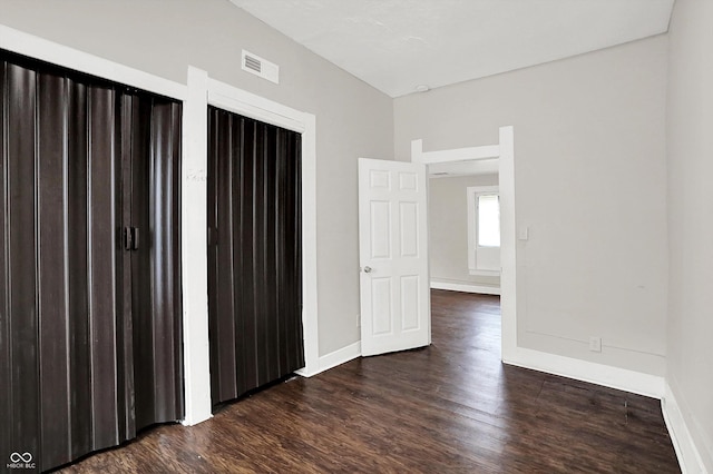 1418 W 5th St, Anderson, IN 46016 - empty room featuring wood finished floors
