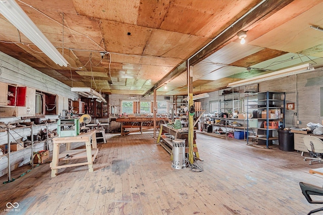 216 N Clinton St, Boswell, IN 47921 - basement with a workshop area and wood-type flooring