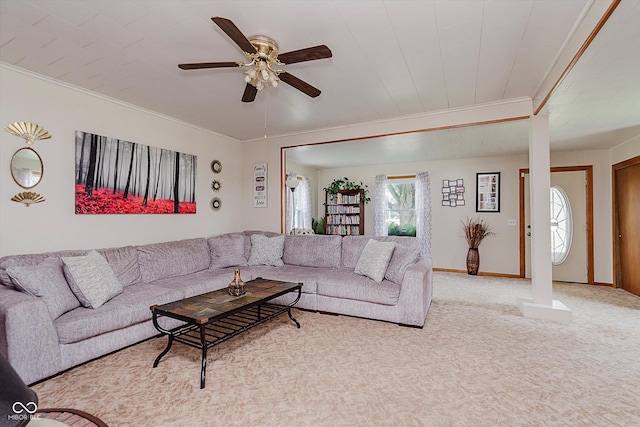 216 N Clinton St, Boswell, IN 47921 - living area featuring ornamental molding, ceiling fan, and carpet flooring