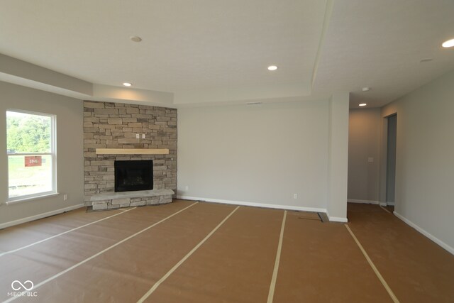 10424 Oak Bend Blvd, Indianapolis, IN 46239 - unfurnished living room with recessed lighting and a fireplace