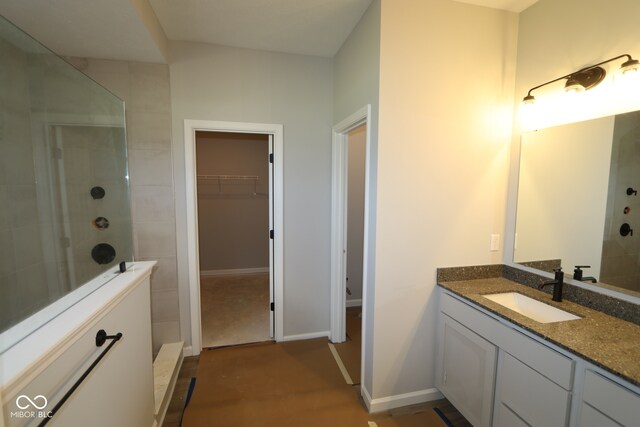 10424 Oak Bend Blvd, Indianapolis, IN 46239 - full bath featuring vanity, tiled shower, and a walk in closet