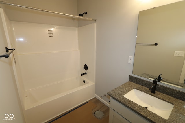 10424 Oak Bend Blvd, Indianapolis, IN 46239 - bathroom featuring vanity, wood finished floors, and bathtub / shower combination