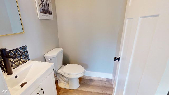 1809 S H St, Elwood, IN 46036 - half bathroom with wood finished floors and vanity