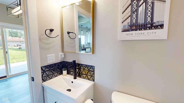 1809 S H St, Elwood, IN 46036 - half bathroom featuring toilet and vanity