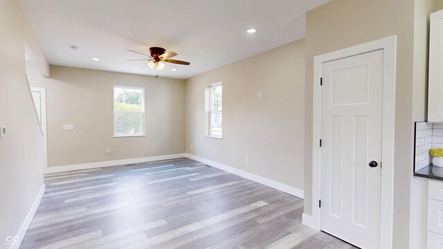 1809 S H St, Elwood, IN 46036 - spare room with a ceiling fan, light wood-style flooring, and recessed lighting