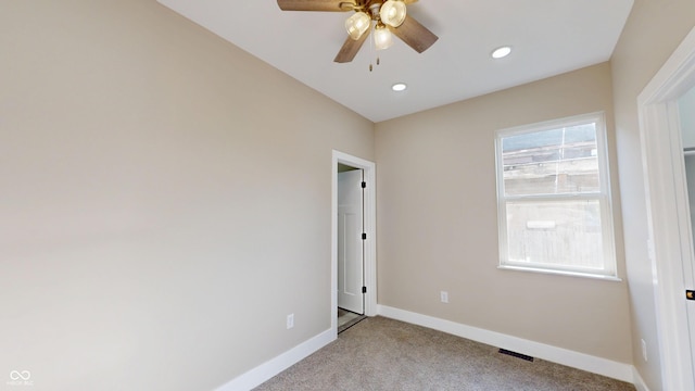 1809 S H St, Elwood, IN 46036 - carpeted empty room featuring ceiling fan and recessed lighting