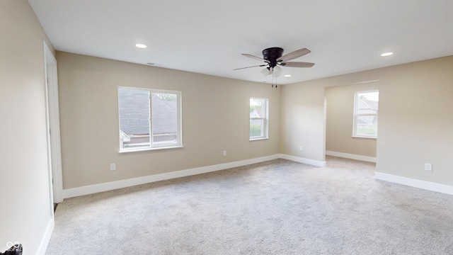 1809 S H St, Elwood, IN 46036 - unfurnished room with a ceiling fan, light colored carpet, and recessed lighting