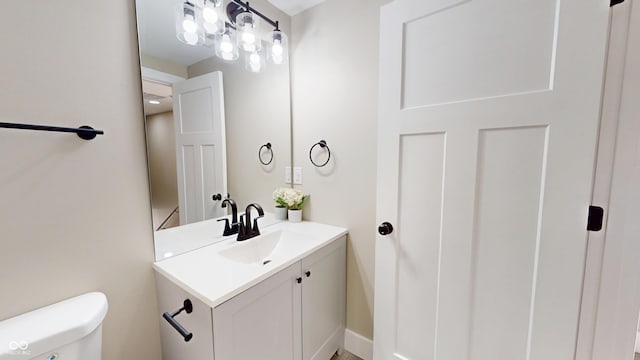 1809 S H St, Elwood, IN 46036 - bathroom with vanity and toilet