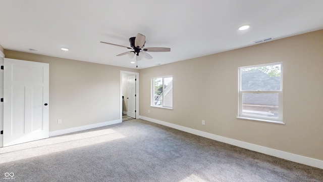1809 S H St, Elwood, IN 46036 - carpeted spare room featuring plenty of natural light, a ceiling fan, and recessed lighting