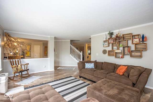 6532 Amherst Way, Zionsville, IN 46077 - living room with wood finished floors, stairs, and ornamental molding