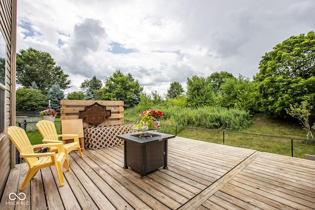 6532 Amherst Way, Zionsville, IN 46077 - wooden deck featuring an outdoor fire pit and view of scattered trees
