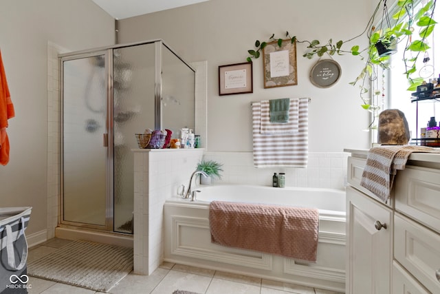 15098 Newburyport Dr, Fortville, IN 46040 - bathroom with a garden tub, a shower stall, tile patterned floors, and vanity