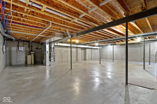 15098 Newburyport Dr, Fortville, IN 46040 - unfinished below grade area with heating unit and a water softener system