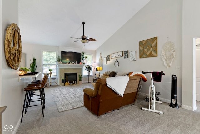 15098 Newburyport Dr, Fortville, IN 46040 - living area with a ceiling fan, carpet floors, a tile fireplace, and high vaulted ceiling