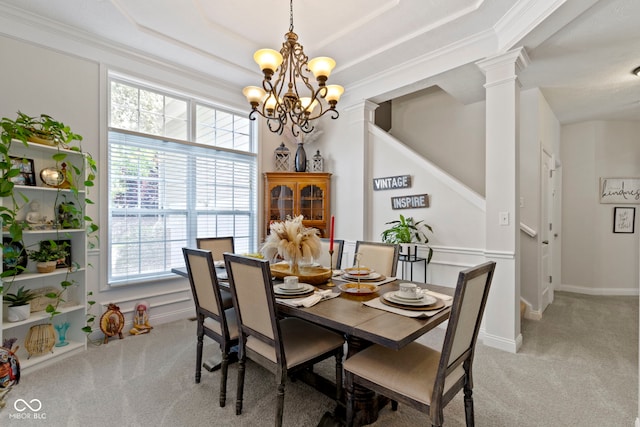 15098 Newburyport Dr, Fortville, IN 46040 - dining room with light carpet, a chandelier, ornamental molding, a tray ceiling, and ornate columns