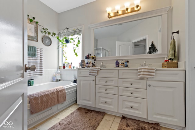 15098 Newburyport Dr, Fortville, IN 46040 - bathroom featuring double vanity, tile patterned floors, a garden tub, and a shower