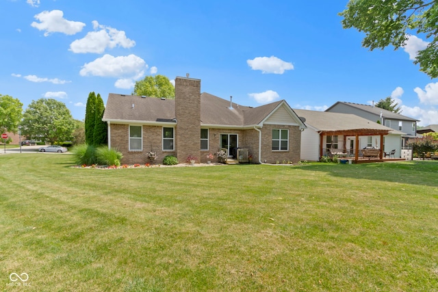 15098 Newburyport Dr, Fortville, IN 46040 - rear view of property featuring a chimney, brick siding, and a yard
