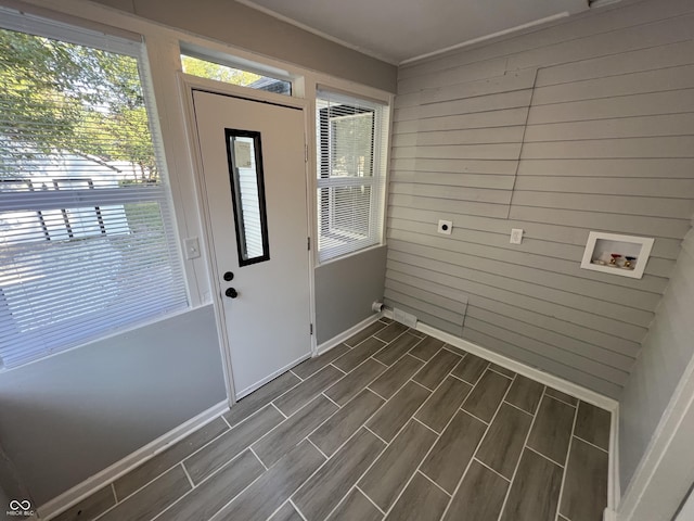 937 N Routiers Ave, Indianapolis, IN 46219 - laundry area featuring hookup for a washing machine, wood finish floors, healthy amount of natural light, and wooden walls
