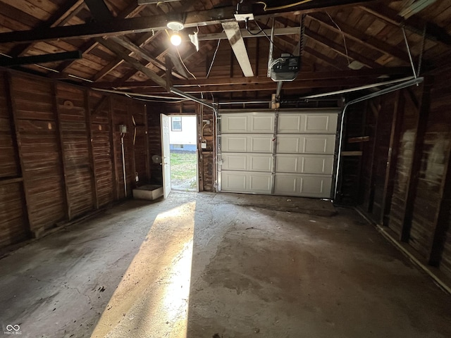 937 N Routiers Ave, Indianapolis, IN 46219 - garage featuring a garage door opener