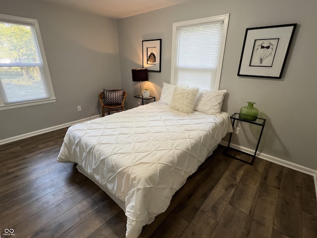 937 N Routiers Ave, Indianapolis, IN 46219 - bedroom with dark wood-style floors and baseboards