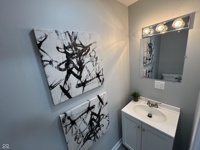 937 N Routiers Ave, Indianapolis, IN 46219 - bathroom with vanity and toilet