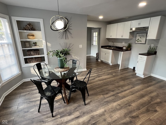 937 N Routiers Ave, Indianapolis, IN 46219 - dining area featuring dark wood-style flooring and recessed lighting