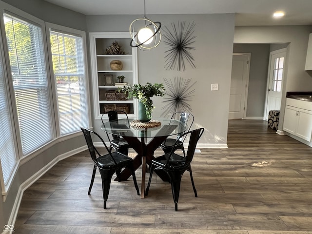937 N Routiers Ave, Indianapolis, IN 46219 - dining space with dark wood-type flooring and recessed lighting