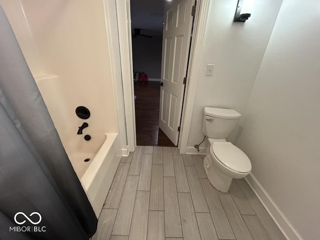 8407 Campbell Ct, Mooresville, IN 46158 - bathroom featuring wood finish floors and shower / tub combo