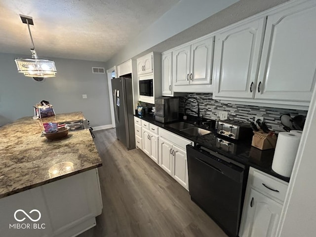 8407 Campbell Ct, Mooresville, IN 46158 - kitchen with black dishwasher, stainless steel refrigerator with ice dispenser, built in microwave, backsplash, and white cabinetry