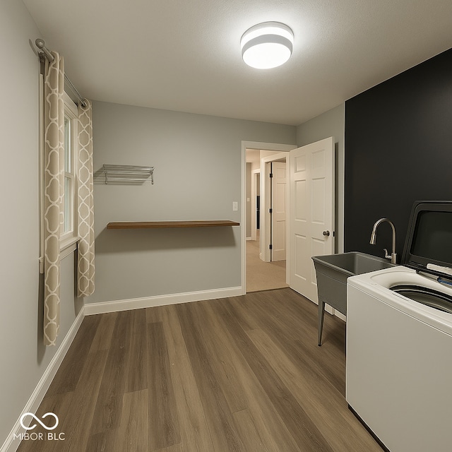 8407 Campbell Ct, Mooresville, IN 46158 - washroom with wood finished floors and stacked washer / drying machine