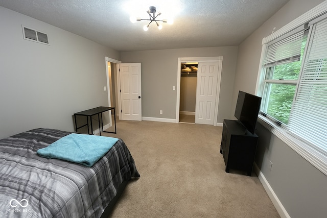 8407 Campbell Ct, Mooresville, IN 46158 - bedroom featuring carpet flooring and a textured ceiling