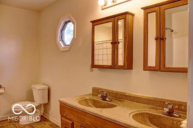 8905 Maze Rd, Indianapolis, IN 46259 - bathroom featuring double vanity and tile patterned floors