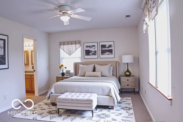 8905 Maze Rd, Indianapolis, IN 46259 - bedroom featuring ensuite bathroom, light carpet, and ceiling fan