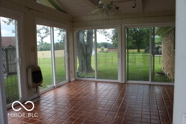 8905 Maze Rd, Indianapolis, IN 46259 - unfurnished sunroom with vaulted ceiling, ceiling fan, and heating unit