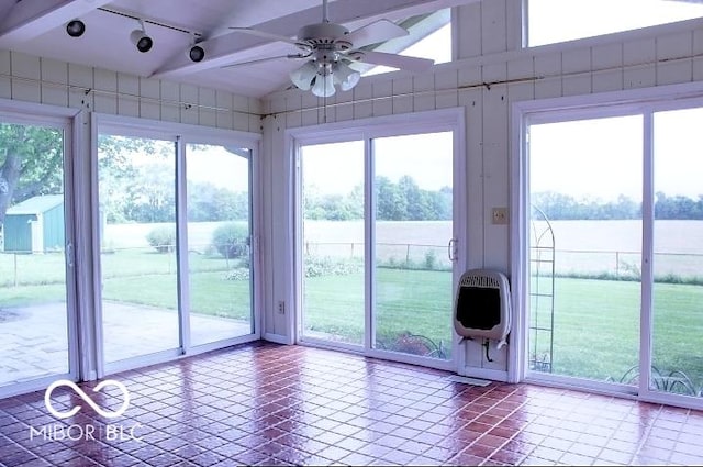 8905 Maze Rd, Indianapolis, IN 46259 - unfurnished sunroom with track lighting, heating unit, a water view, lofted ceiling, and plenty of natural light