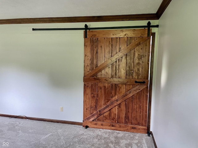 540 Lazy Ln, Greenwood, IN 46142 - detailed view of carpet, a barn door, and ornamental molding