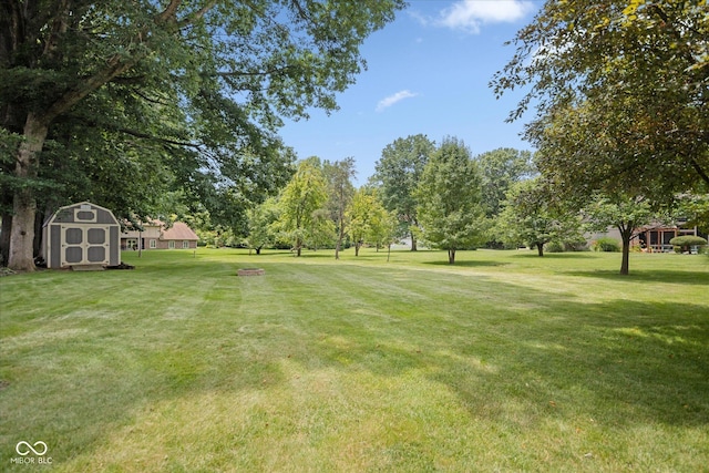 540 Lazy Ln, Greenwood, IN 46142 - view of grassy yard featuring a storage shed