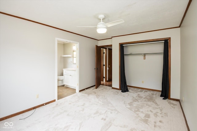 540 Lazy Ln, Greenwood, IN 46142 - unfurnished bedroom featuring ornamental molding, light carpet, a closet, ensuite bathroom, and a ceiling fan