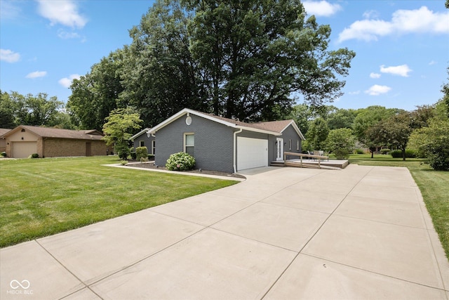 540 Lazy Ln, Greenwood, IN 46142 - view of front of house with a front yard, a garage, brick siding, and concrete driveway