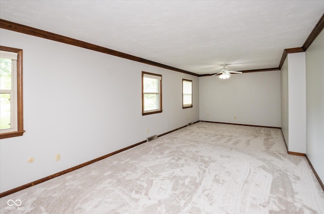 540 Lazy Ln, Greenwood, IN 46142 - empty room featuring ornamental molding, light carpet, and a ceiling fan