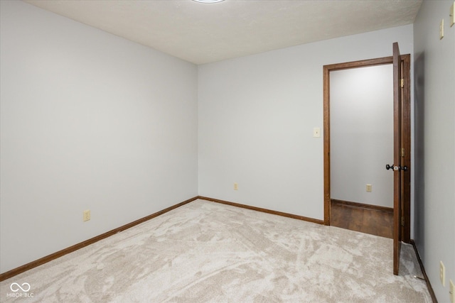 540 Lazy Ln, Greenwood, IN 46142 - carpeted empty room with baseboards