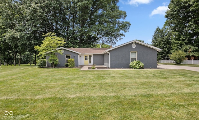 540 Lazy Ln, Greenwood, IN 46142 - view of front facade with brick siding and a chimney