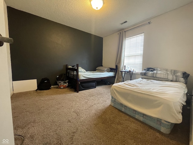 1503 Quinlan Ct, Indianapolis, IN 46217 - carpeted bedroom with a textured ceiling