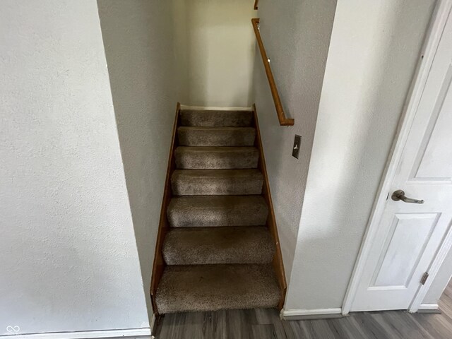 1503 Quinlan Ct, Indianapolis, IN 46217 - staircase with wood finished floors and baseboards