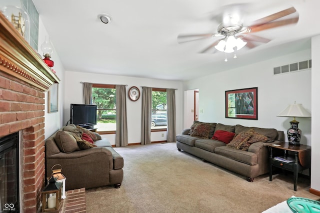 1224 S Hunter Rd, Indianapolis, IN 46239 - carpeted living room featuring ceiling fan and a fireplace
