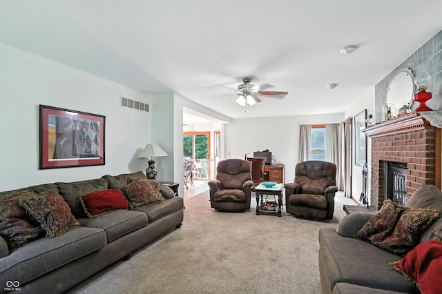 1224 S Hunter Rd, Indianapolis, IN 46239 - living area featuring carpet floors, a ceiling fan, and a fireplace
