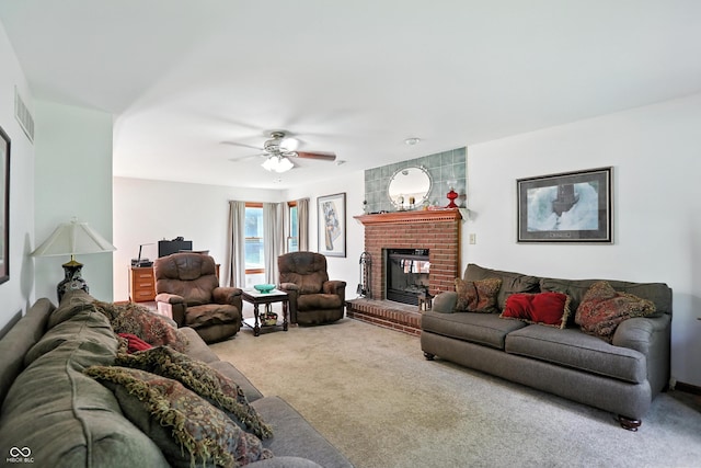 1224 S Hunter Rd, Indianapolis, IN 46239 - carpeted living area with a fireplace and a ceiling fan