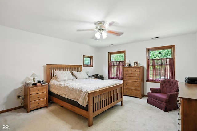 1224 S Hunter Rd, Indianapolis, IN 46239 - bedroom featuring light colored carpet and ceiling fan