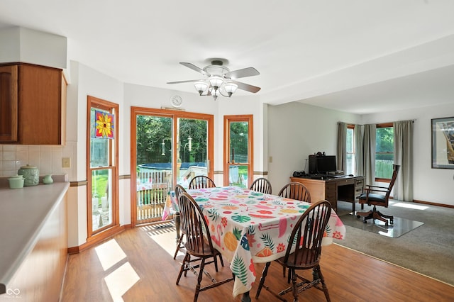 1224 S Hunter Rd, Indianapolis, IN 46239 - dining area with a ceiling fan and light wood-style flooring