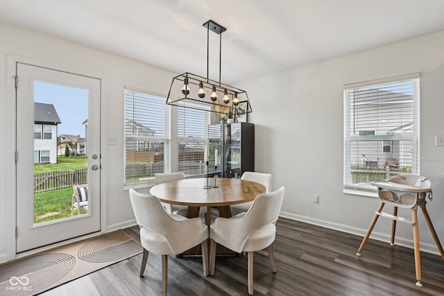 1414 W Springhurst Blvd, Greenfield, IN 46140 - dining space with dark wood finished floors and baseboards